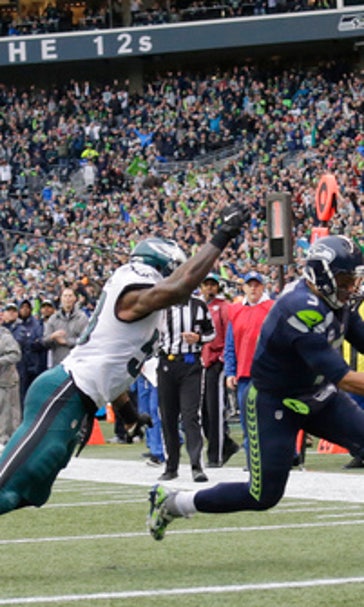Wilson throws, catches, leads Seahawks past Eagles 26-15